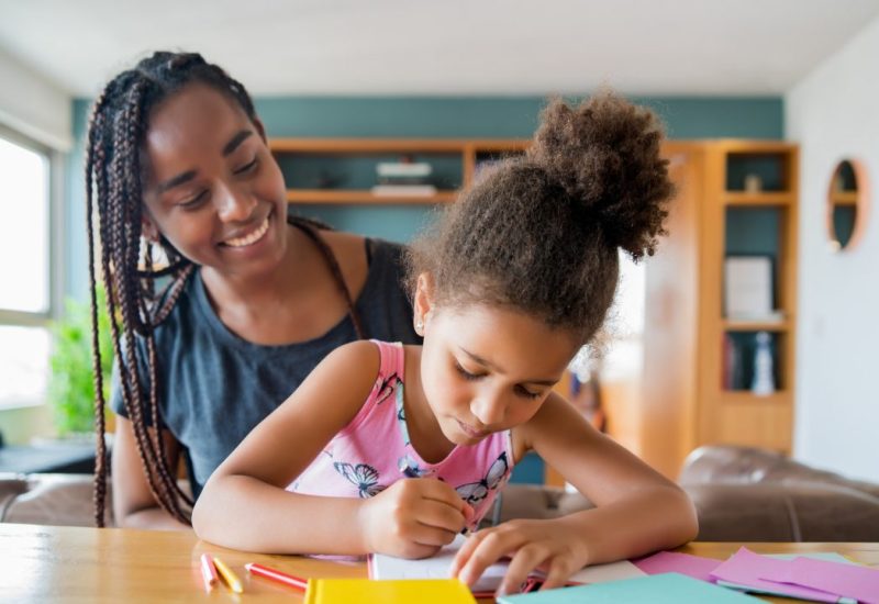 a-father-helping-her-daughter-with-homeschool-.jpg